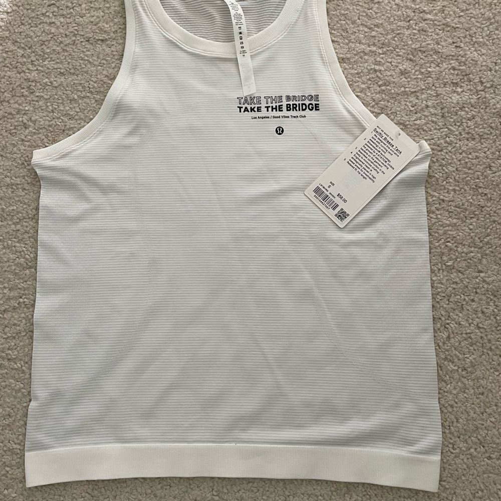 Lululemon Swiftly Breeze tank “Take The Bridge Los Angeles”. White color, size 6